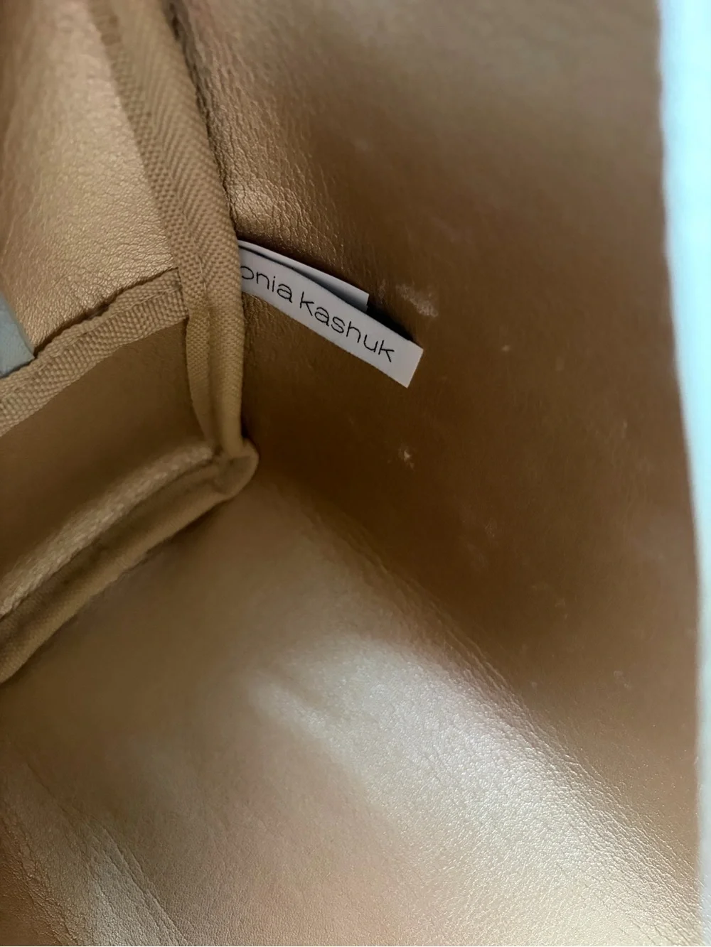 very light green makeup bag